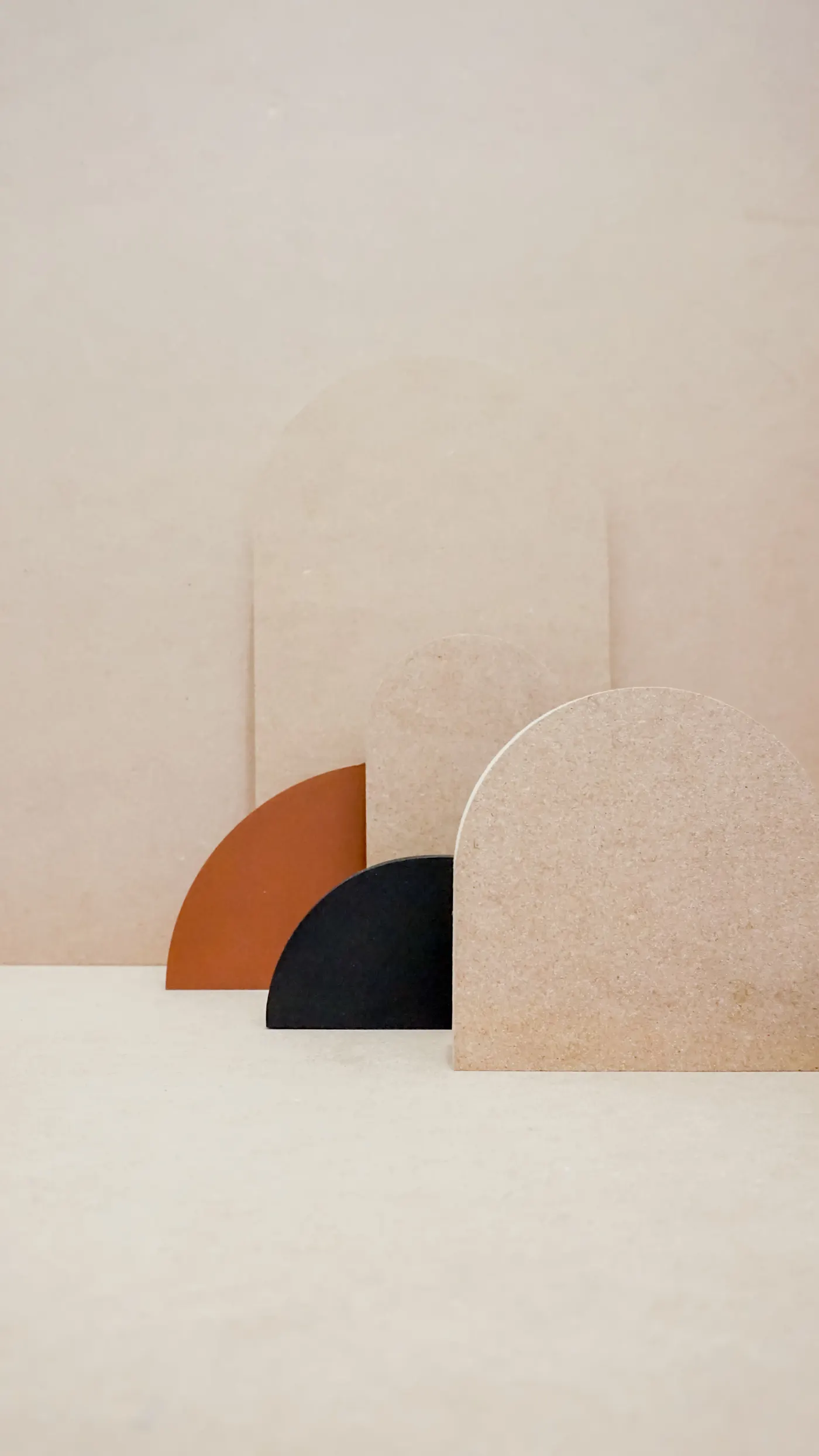 Abstract sculptural arches in warm neutral tones